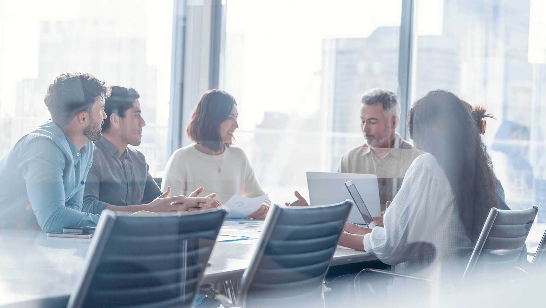 Group of senior executives meeting in a boardroom